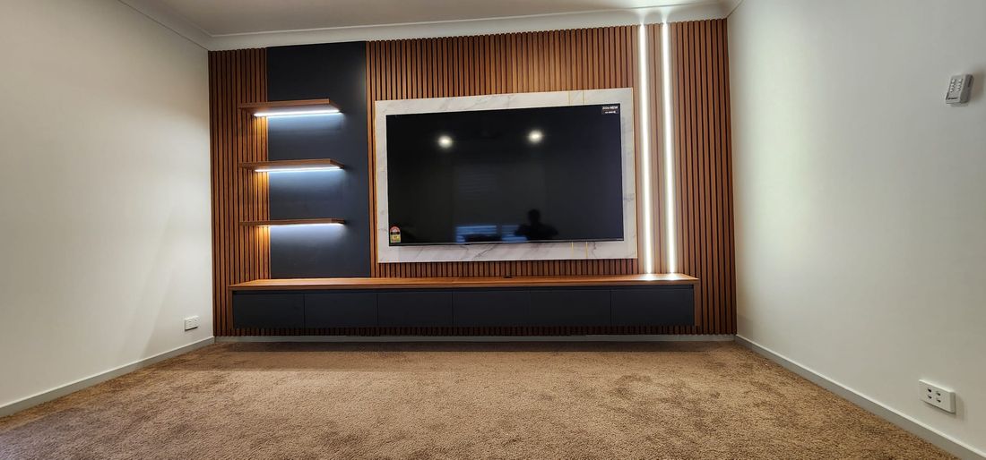 Timber media wall with LED strip lighting